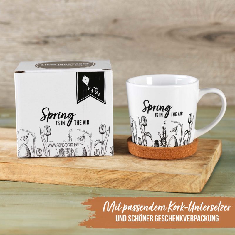 Spring is in the air Tasse mit Kork Untersetzer Papierdrachen