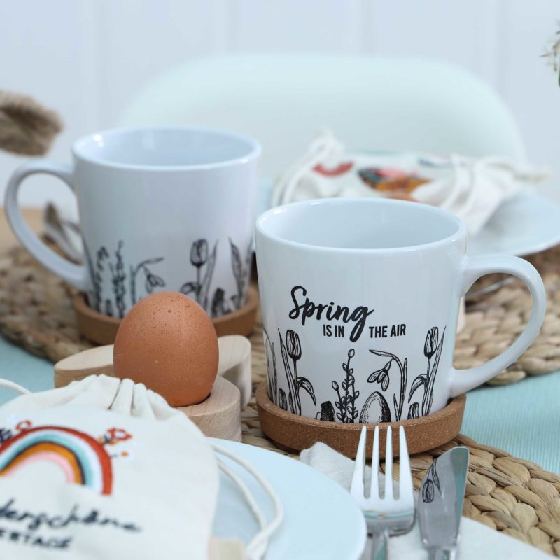 Spring is in the air Tasse mit Kork Untersetzer Papierdrachen